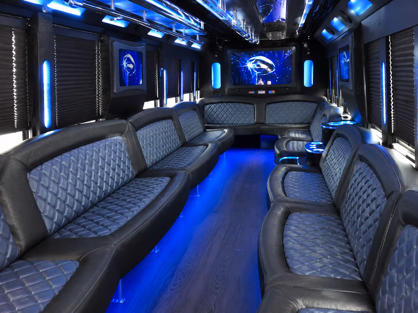 Wedding guests seated inside a party bus serving Elizabeth